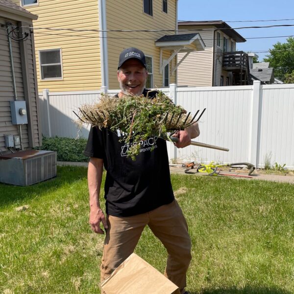 iSpace-Environments-iMPACT-Spring-Clean-Up-with-Senior-Services-2023-Weeds-on-Rake