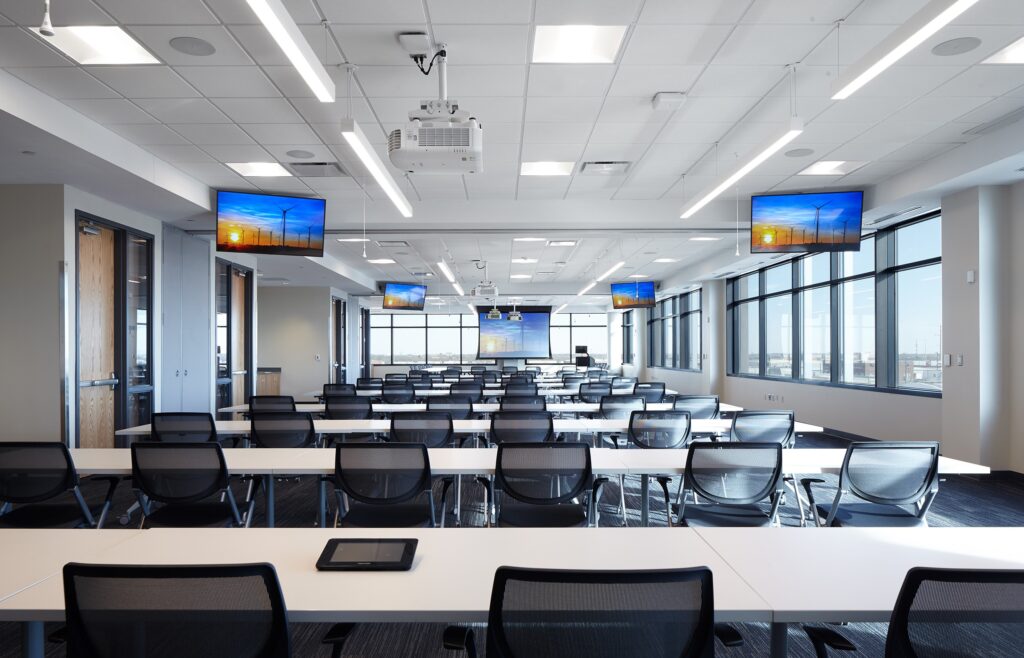 large training room with multiple displays for visual equity among all participants