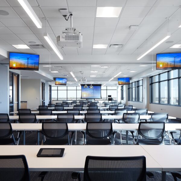 large training room with multiple displays for visual equity among all participants