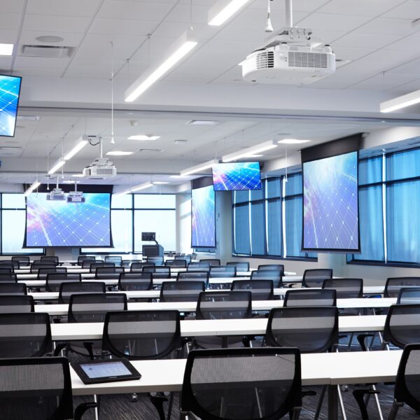 side view of large training room with multiple displays for visual equity among all participants