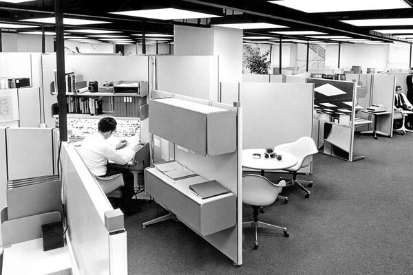 black and white photo of office cubicles in 1969