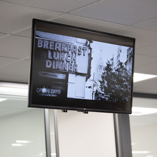 tv display hanging from ceiling