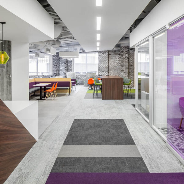lobby area showing enclosed and open meeting and collaboration areas to increase employee engagement