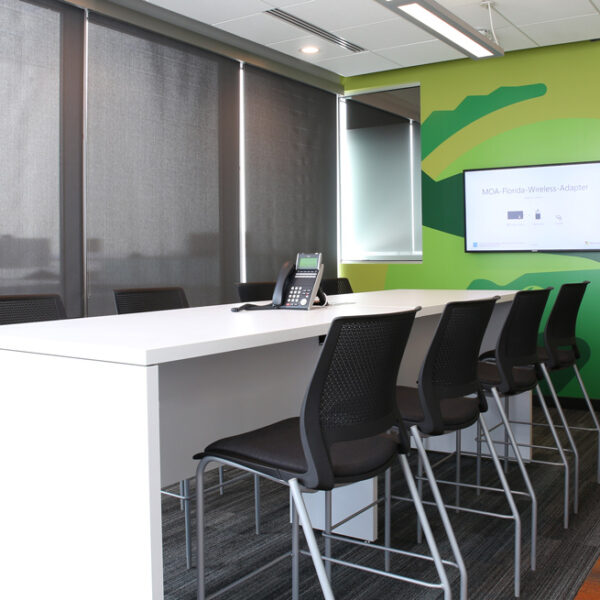 hub table and stools in workspace for informal gatherings or quick collaboration