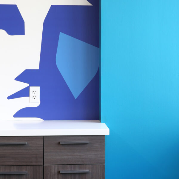 colorful wall and wallpaper with millwork cabinetry